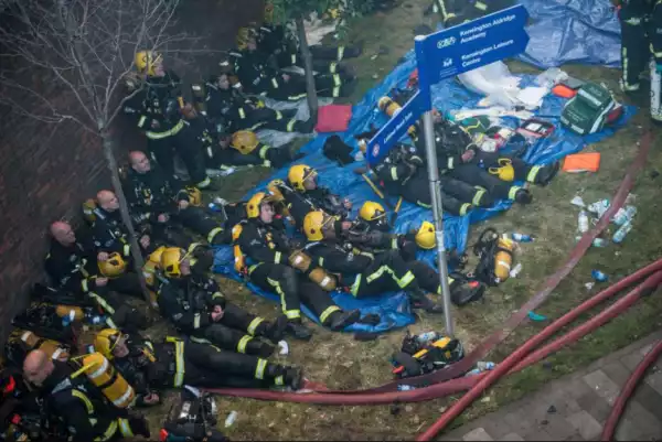 Photo Of Firefighters Looking Very Tired After Putting Off The Grenfell Fire